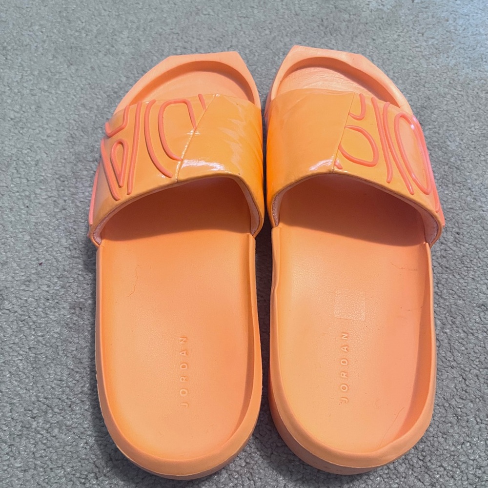 Jordan Women's Orange Slide Sandals, men’s 7, women’s 9